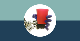 A robotic hand holding a cup 